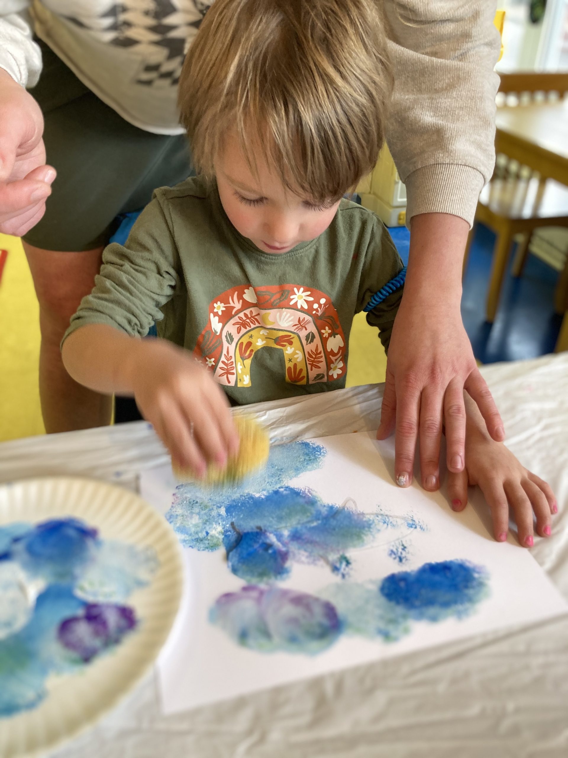 Preschool centers refer to designated areas within a preschool classroom where children engage in specific types of play and learning activities.