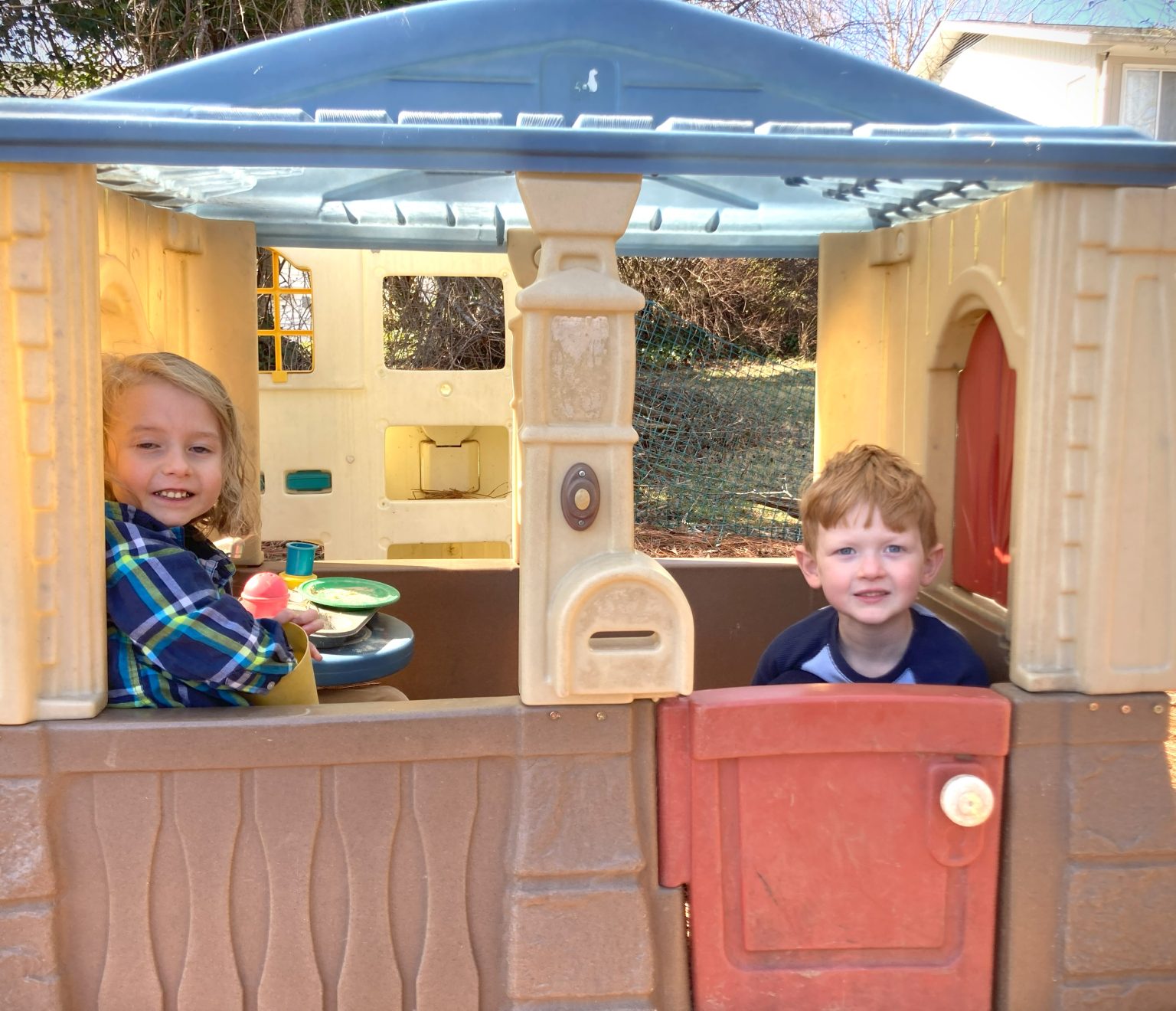 Kids playing outside at Morning Explorers preschool in Black Mountain NC